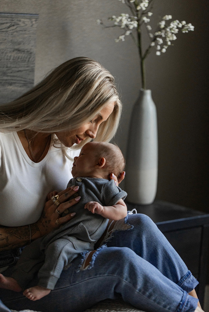Coach Taylor is holding the baby